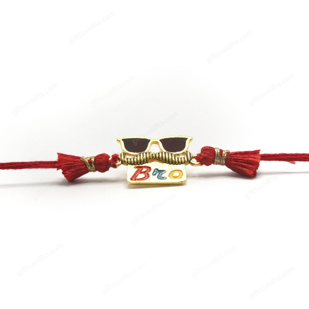 Cool Bro Mustache Rakhi with a goggle design, mustache center, and 'Bro' plate, featuring a metallic rim and glossy brown resin glass.