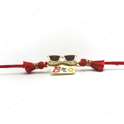 Cool Bro Mustache Rakhi with a goggle design, mustache center, and 'Bro' plate, featuring a metallic rim and glossy brown resin glass.